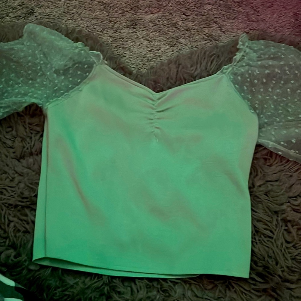 Green flared shoulder shirt